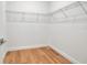 Walk-in closet with wire shelving and hardwood floors at 600 3Rd S Ave # 401, St Petersburg, FL 33701