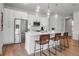 Bright, modern kitchen featuring stainless appliances and island with barstool seating at 600 3Rd S Ave # 401, St Petersburg, FL 33701