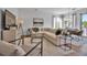 Bright and airy living room with large windows and stylish furnishings at 600 3Rd S Ave # 401, St Petersburg, FL 33701