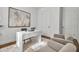 Office features a modern desk, artwork, and comfortable seating at 600 3Rd S Ave # 401, St Petersburg, FL 33701
