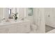 Spa-like bathroom with double vanity, large shower, and modern fixtures at 600 3Rd S Ave # 405, St Petersburg, FL 33701