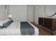 Comfortable bedroom with a dresser and ensuite bathroom at 600 3Rd S Ave # 405, St Petersburg, FL 33701