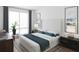 Modern bedroom with large window and home office space at 600 3Rd S Ave # 405, St Petersburg, FL 33701