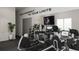 Well-equipped home gym featuring state-of-the-art exercise equipment, a large mirror, and motivational decor at 600 3Rd S Ave # 405, St Petersburg, FL 33701
