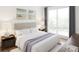Cozy bedroom with plush bedding and large windows at 600 3Rd S Ave # 506, St Petersburg, FL 33701
