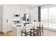 Bright kitchen with stainless steel appliances, white cabinetry, and a spacious center island with bar stool seating at 600 3Rd S Ave # 506, St Petersburg, FL 33701