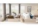Open-concept living and dining area features contemporary furnishings, a large window, and stylish decor at 600 3Rd S Ave # 506, St Petersburg, FL 33701