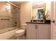 Bathroom with walk-in shower and granite vanity at 6372 Palma Del Mar S Blvd # 705, St Petersburg, FL 33715