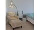 Relaxing bedroom with sitting area and ocean views at 6372 Palma Del Mar S Blvd # 705, St Petersburg, FL 33715