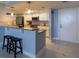 Updated kitchen with breakfast bar and stainless steel appliances at 6372 Palma Del Mar S Blvd # 705, St Petersburg, FL 33715