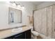 Bathroom vanity with a modern mirror and dark cabinets at 805 Islebay Dr, Apollo Beach, FL 33572