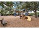 A fun playground area with slides, climbing structures, and a shade canopy, perfect for  at 805 Islebay Dr, Apollo Beach, FL 33572