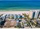 Aerial of beachfront homes, vacant lot, and ocean at 820 Gulf Blvd # S 1-3, Indian Rocks Beach, FL 33785