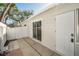 Small back patio with access to the inside of the home at 820 Gulf Blvd # S 1-3, Indian Rocks Beach, FL 33785