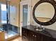 Elegant bathroom with granite vanity and walk-in shower at 820 Gulf Blvd # S 1-3, Indian Rocks Beach, FL 33785