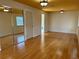 Large bedroom with hardwood floors and mirrored closet doors at 820 Gulf Blvd # S 1-3, Indian Rocks Beach, FL 33785