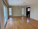 Bright dining room featuring hardwood floors and sliding glass doors at 820 Gulf Blvd # S 1-3, Indian Rocks Beach, FL 33785