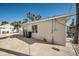 Light-colored house with a side yard and driveway at 820 Gulf Blvd # S 1-3, Indian Rocks Beach, FL 33785
