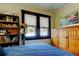 Bright bedroom featuring a bookcase, window seating and hardwood floors at 115 Athens St, Tarpon Springs, FL 34689