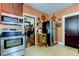 Kitchen boasts stainless steel appliances and ample storage at 115 Athens St, Tarpon Springs, FL 34689