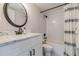 Updated bathroom with white subway tile and a white vanity at 1310 E 19Th Ave # A, Tampa, FL 33605