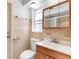 Bathroom featuring a vanity with mirror and tiled walls at 1340 Williams Dr, Clearwater, FL 33764