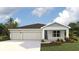 Curb appeal abounds in this 3-car garage home! at 17471 Whiskey Creek Trl, Parrish, FL 34219