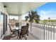 Enjoy water views from this private balcony with patio furniture at 18610 Gulf Blvd # 108, Indian Shores, FL 33785