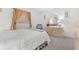 Well-lit bedroom with a full bed and updated furnishings at 18610 Gulf Blvd # 108, Indian Shores, FL 33785