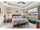 Bright bedroom featuring a king bed and neutral color palette at 19315 Hawk Valley Dr, Tampa, FL 33647