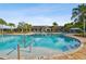 Resort-style pool with a large deck and clubhouse in the background at 19315 Hawk Valley Dr, Tampa, FL 33647