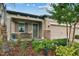 Inviting front porch with a bench and landscaping at 19315 Hawk Valley Dr, Tampa, FL 33647