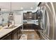 Modern kitchen with stainless steel appliances and an island at 19315 Hawk Valley Dr, Tampa, FL 33647
