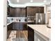 Modern kitchen with stainless steel appliances and an island at 19315 Hawk Valley Dr, Tampa, FL 33647