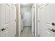 Bright laundry room with washer, dryer, and extra storage at 19315 Hawk Valley Dr, Tampa, FL 33647