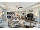 Open floor plan with living and dining areas, featuring neutral tones at 19315 Hawk Valley Dr, Tampa, FL 33647