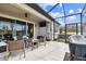 Screened patio, outdoor furniture and grill at 19315 Hawk Valley Dr, Tampa, FL 33647
