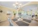 Dining room with view of living room and kitchen at 19417 Gulf Blvd # C-211, Indian Shores, FL 33785