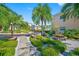Shared patio area with picnic tables and benches at 19417 Gulf Blvd # C-211, Indian Shores, FL 33785