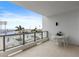Outdoor balcony with seating area overlooking a resort-style pool at 301 1St S St # 803, St Petersburg, FL 33701