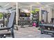 Fitness center with weight machines and cardio equipment, plus a large screen TV at 301 1St S St # 803, St Petersburg, FL 33701