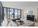 Bright living room with city views and access to a spacious balcony at 301 1St S St # 803, St Petersburg, FL 33701