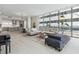 Open concept living space showcasing modern furniture and a sleek kitchen at 301 1St S St # 803, St Petersburg, FL 33701