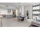 Open living and dining area with modern furniture and ocean view at 301 1St S St # 803, St Petersburg, FL 33701