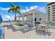 Stunning rooftop patio area with a grill, outdoor seating, and lovely landscaping at 301 1St S St # 803, St Petersburg, FL 33701