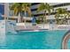 Inviting in-ground pool with water features and comfortable lounge seating at 301 1St S St # 803, St Petersburg, FL 33701