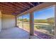 Relaxing screened porch overlooking a grassy backyard at 3162 Oyster Bayou Way, Clearwater, FL 33759