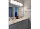 Bathroom with double sinks, updated cabinets, and vanity area at 4220 Players Pl # 2221, Sarasota, FL 34238