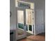Community billiards room with double doors and green walls at 4220 Players Pl # 2221, Sarasota, FL 34238