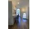Kitchen features a breakfast bar with seating and white cabinets at 4220 Players Pl # 2221, Sarasota, FL 34238
